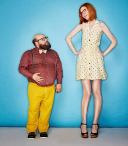 Tall woman and short man --- Image by © Tim Tadder/Corbis