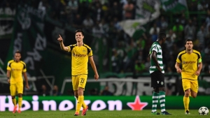 Dortmund's midfielder Julian Weigl (2L) celebrates after scoring during the UEFA Champions League football match Sporting CP vs BVB Borussia Dortmund at the Jose Alvalade stadium in Lisbon on October 18, 2016. / AFP / FRANCISCO LEONG        (Photo credit should read FRANCISCO LEONG/AFP/Getty Images)