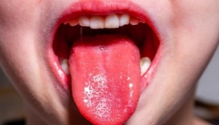 Britanski naučnik upozorio na sve češći simptom – “covid jezik”
