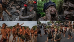 Bali: Muškarci, žene i djeca u nošnjama tradicionalno se valjaju u blatu